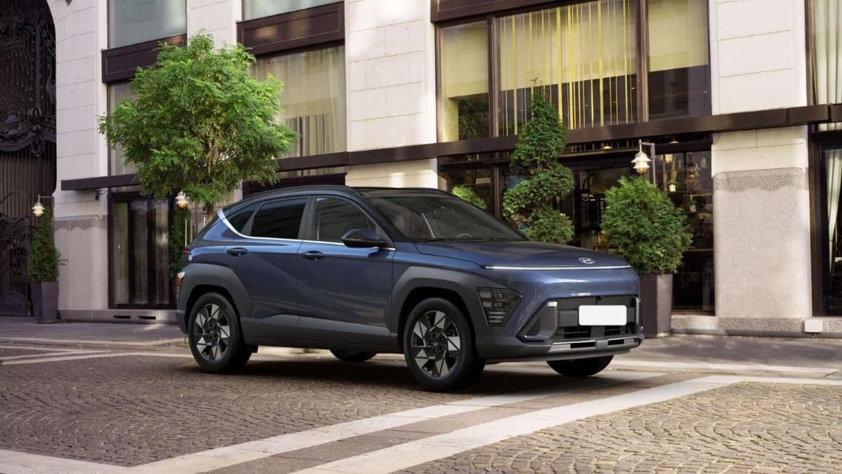 Hyundai Kona Hybrid in Denim Blue parked on a city street - Ireland 2026 buyer guide