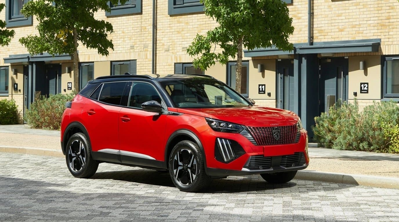 Red Peugeot 2008 with a PureTech petrol engine parked on a residential street